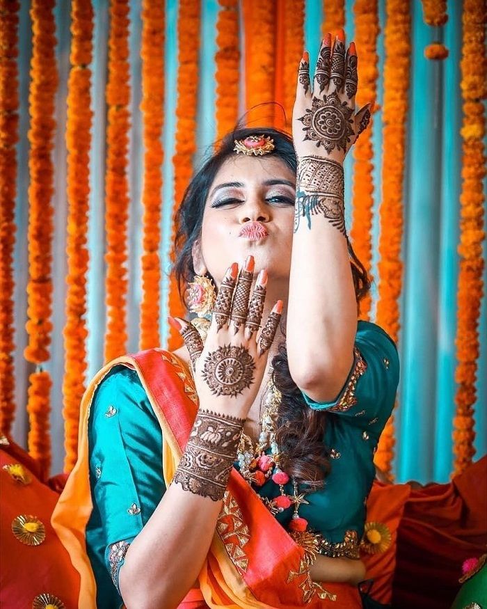 Top 10 Mehndi Poses for Bride To Be in 2023